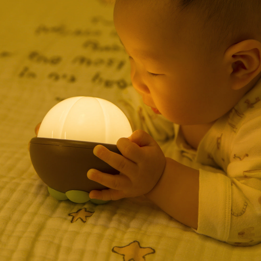 Rustic Bamboo Night Light, featuring a cylinder shape made from natural bamboo strips, casting a warm and soothing glow that highlights the beautiful texture of the bamboo. The night light is displayed on a wooden surface, emphasizing its earthy and organic design.