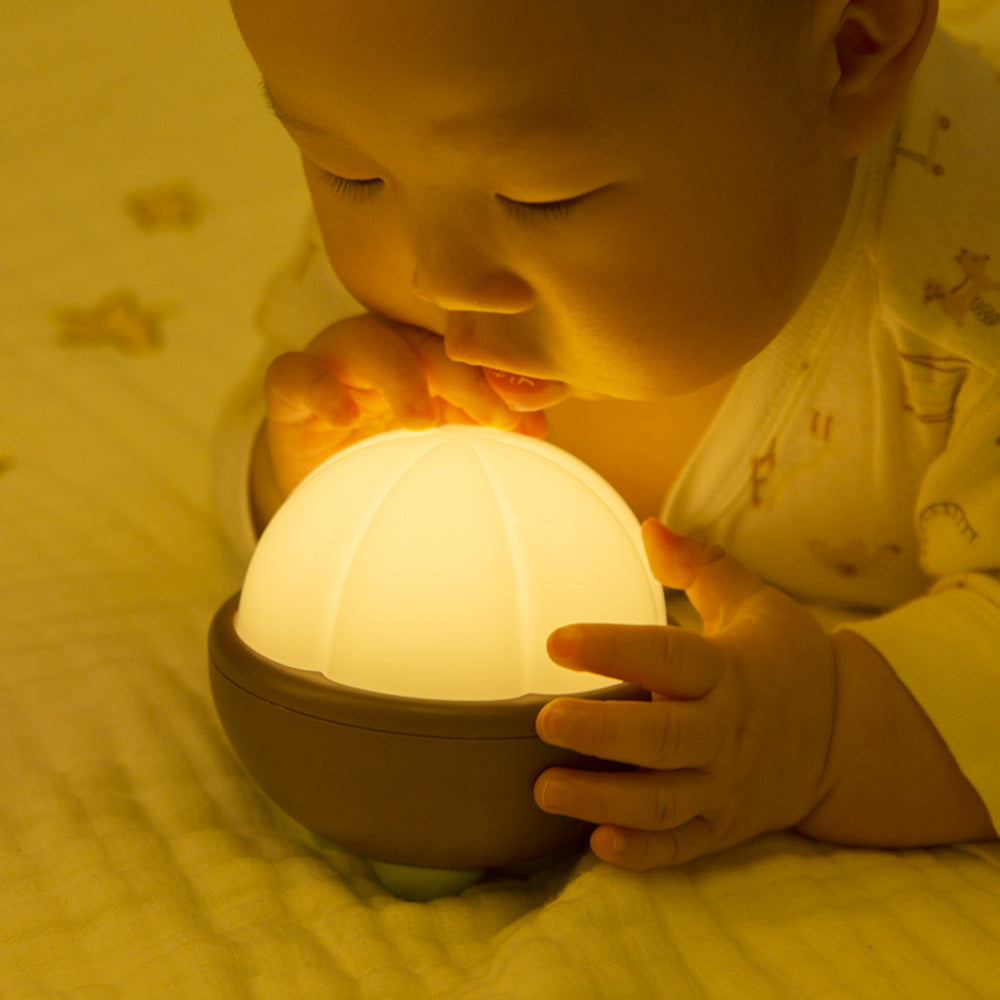Rustic Bamboo Night Light, featuring a cylinder shape made from natural bamboo strips, casting a warm and soothing glow that highlights the beautiful texture of the bamboo. The night light is displayed on a wooden surface, emphasizing its earthy and organic design.