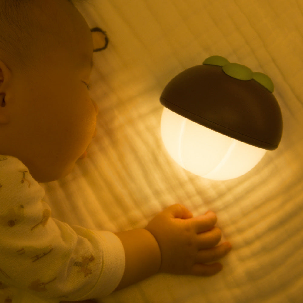 Rustic Bamboo Night Light, featuring a cylinder shape made from natural bamboo strips, casting a warm and soothing glow that highlights the beautiful texture of the bamboo. The night light is displayed on a wooden surface, emphasizing its earthy and organic design.