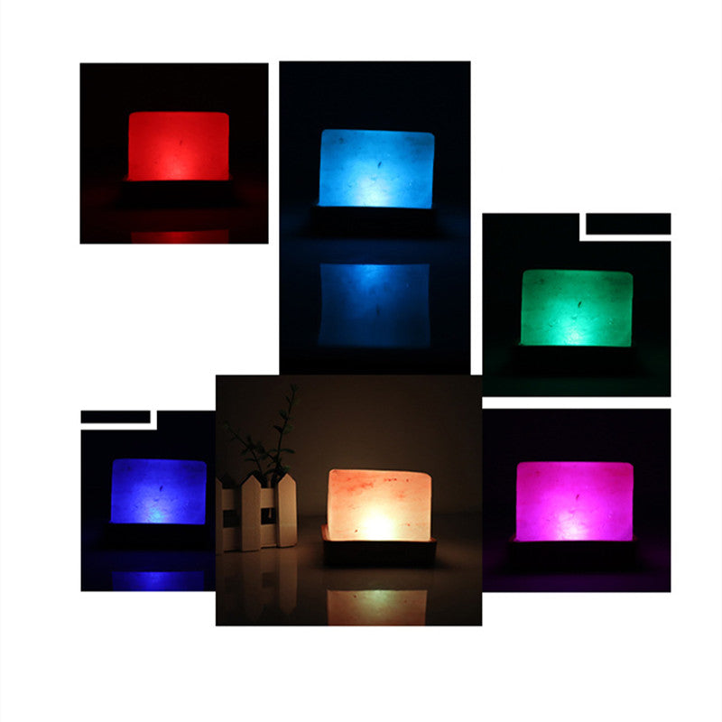 Salt Block Lamp on Table - A lamp made from natural salt crystals, emitting a warm and soothing glow, perfect for adding a touch of natural radiance to your space.