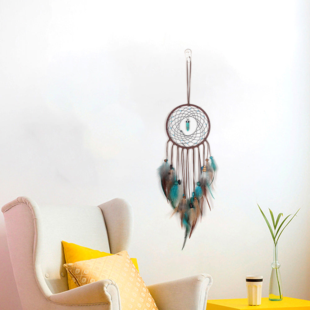 Turquoise Dream Catcher - A stylish and intricate dream catcher in vibrant turquoise, symbolizing protection and beauty, perfect for adding elegance to your decor.