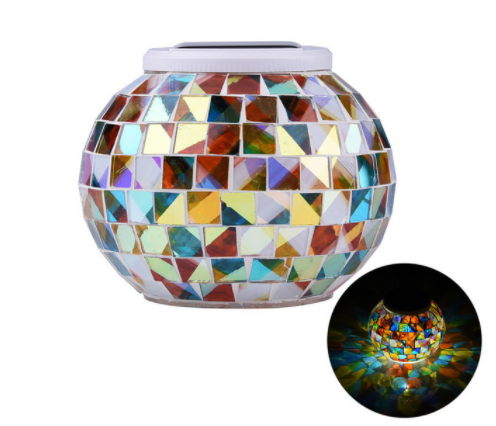 Solar Glass Light in Garden - An eco-friendly garden light, powered by the sun and featuring a glass design, perfect for adding a warm and inviting glow to your outdoor sanctuary.