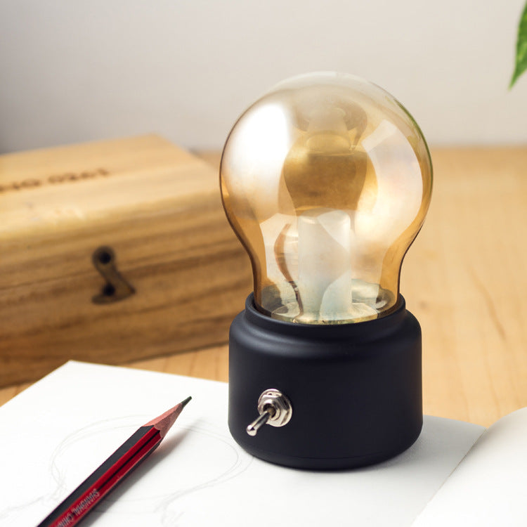 Vintage LED Lamp on Table - A classic, retro-style lamp with modern LED technology, perfect for infusing your space with vintage elegance and charm.
