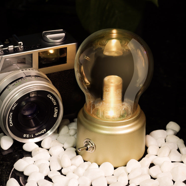 Vintage LED Lamp on Table - A classic, retro-style lamp with modern LED technology, perfect for infusing your space with vintage elegance and charm.