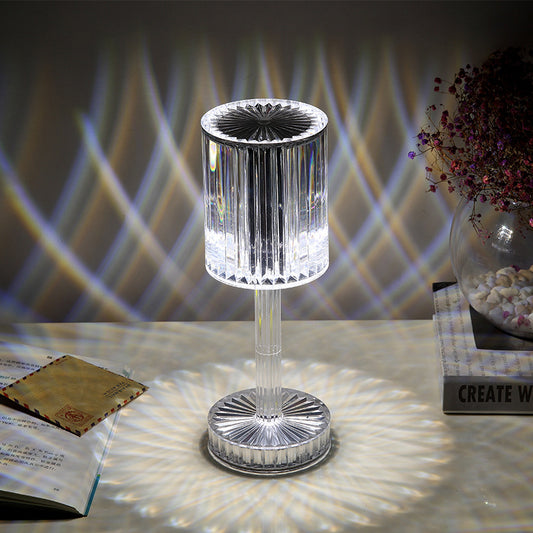 Sophisticated crystal table lamp emitting warm LED light