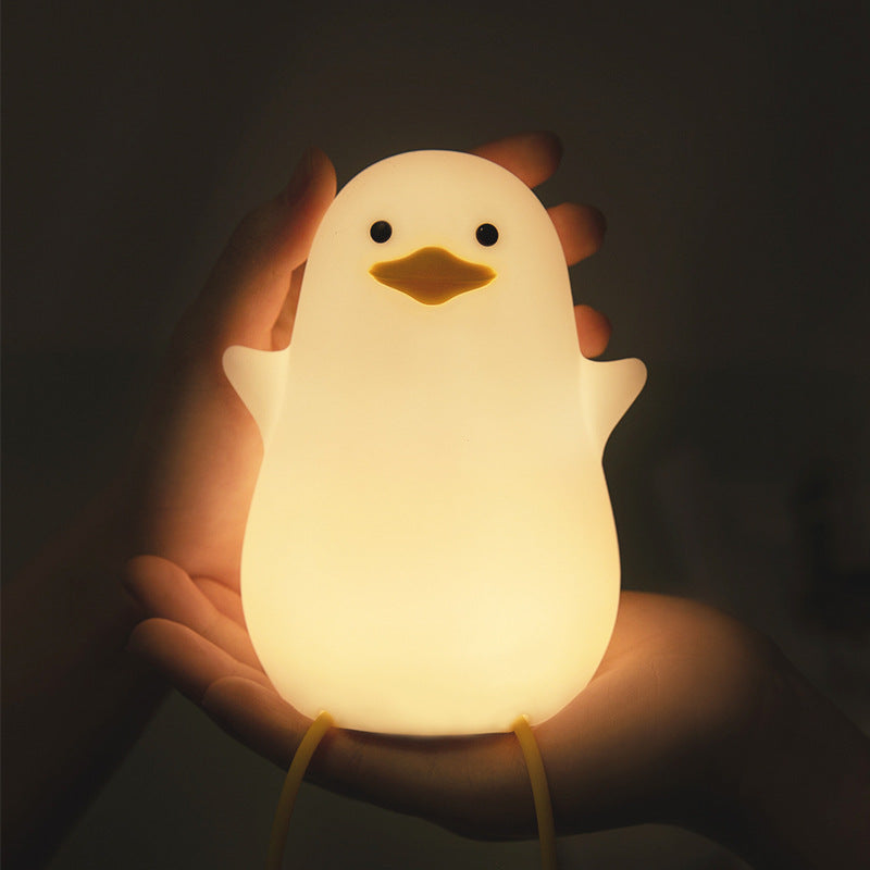 Charming Seagull Night Light crafted in the shape of a seagull, emitting a soft and comforting glow. The light is made from high-quality materials and is displayed against a neutral background, highlighting its intricate design and the calming ambiance it brings to any room.