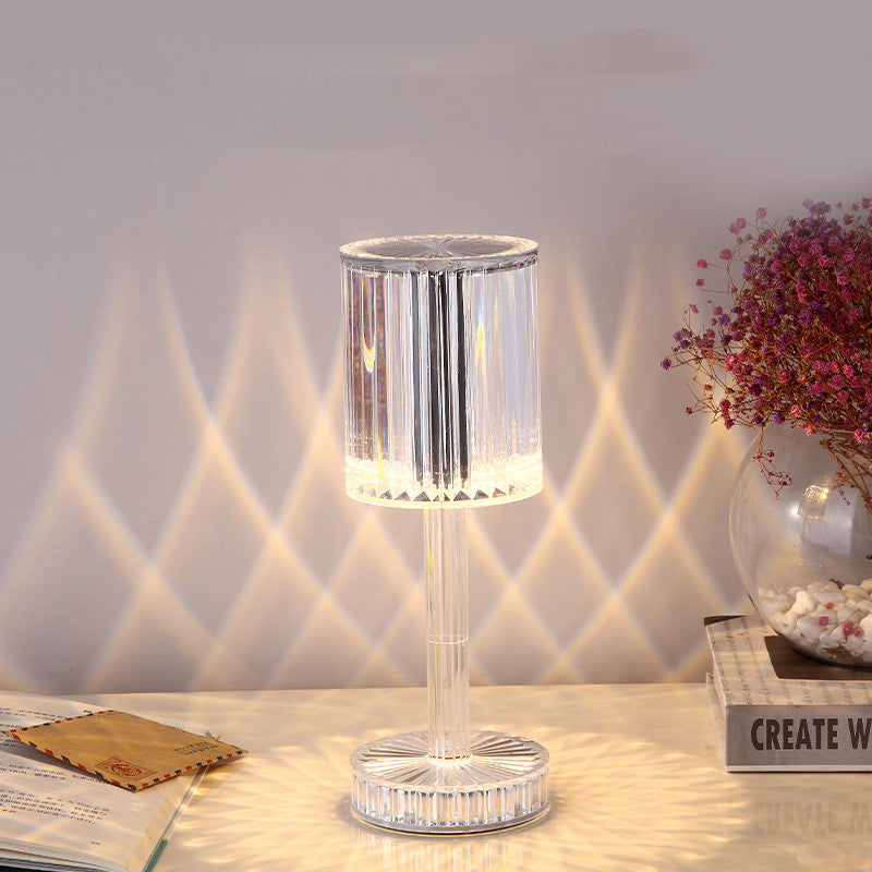 Sophisticated crystal table lamp emitting warm LED light