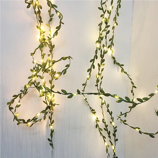 Leaf rattan light string illuminating outdoor space