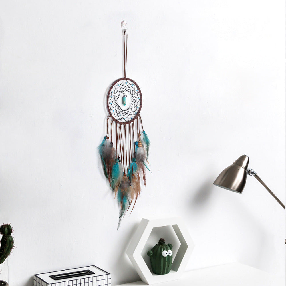 Turquoise Dream Catcher - A stylish and intricate dream catcher in vibrant turquoise, symbolizing protection and beauty, perfect for adding elegance to your decor.