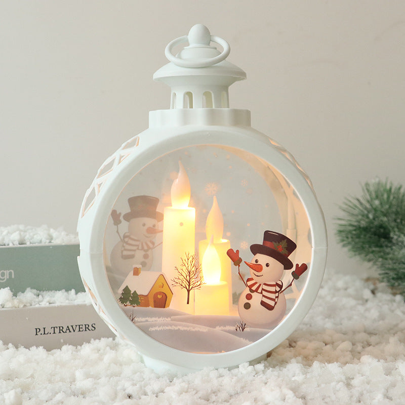 Candle lights illuminate festive retro window decorations