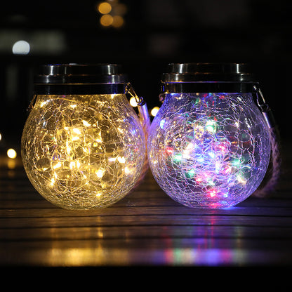 Crackle glass solar lights radiating enchanting glow