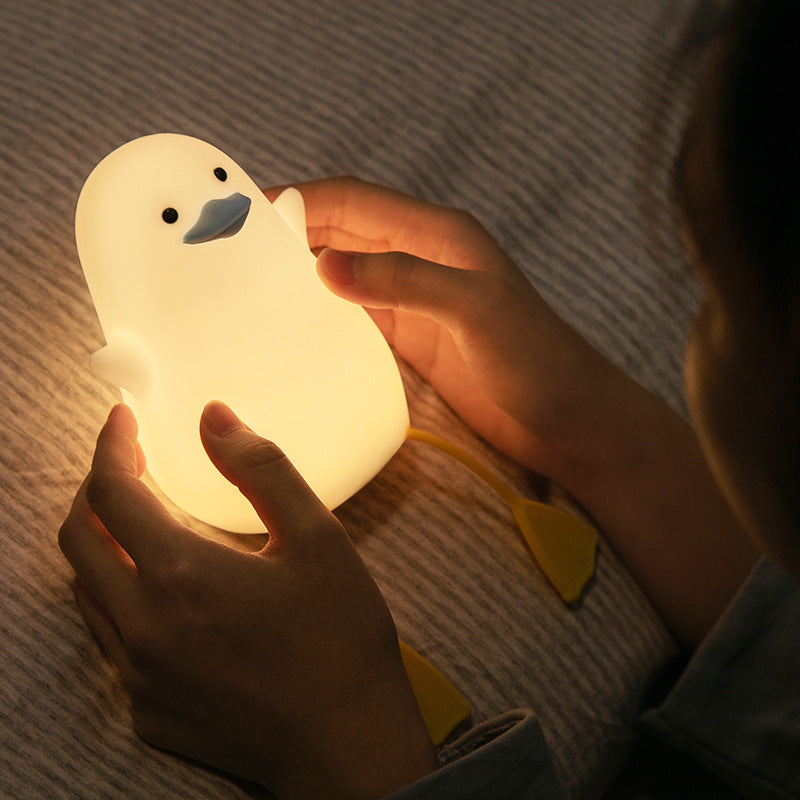 Charming Seagull Night Light crafted in the shape of a seagull, emitting a soft and comforting glow. The light is made from high-quality materials and is displayed against a neutral background, highlighting its intricate design and the calming ambiance it brings to any room.