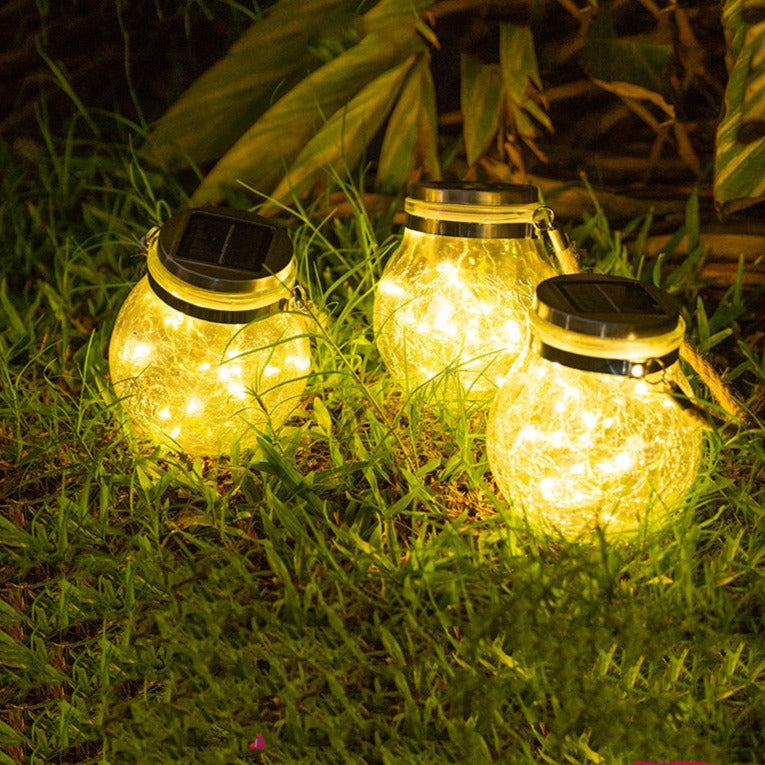 Crackle glass solar lights radiating enchanting glow